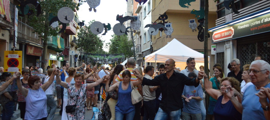 Raül Romeva, cap de llista de Junts pel Sí, gaudeix de la Festa Major de Sants